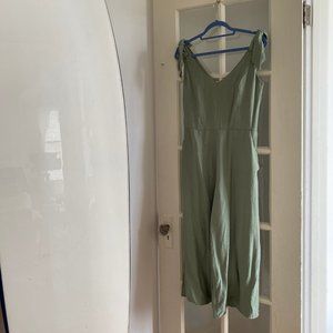 Fitted sage green jumpsuit with culotte style pant
